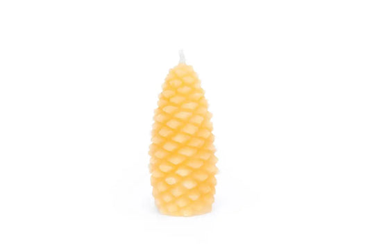 Fir cone candle with a scaled texture in golden beeswax, shown on a white background.